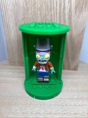 Green Zombie Minifigure Toy with Display Capsule